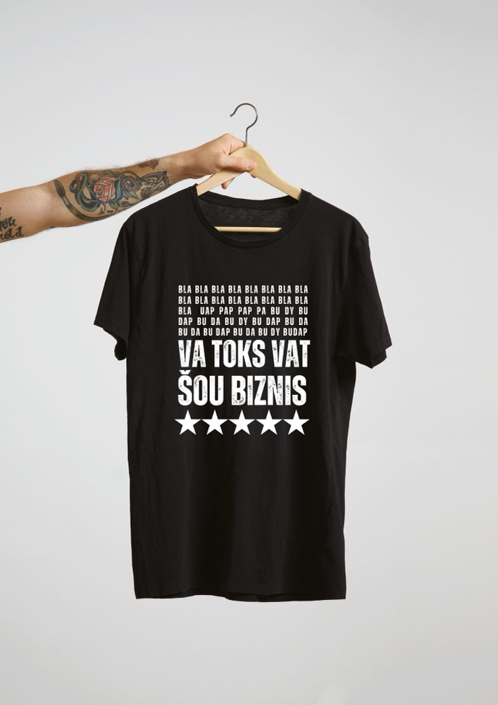 'Va toks vat šou biznis' t-shirt on a hanger